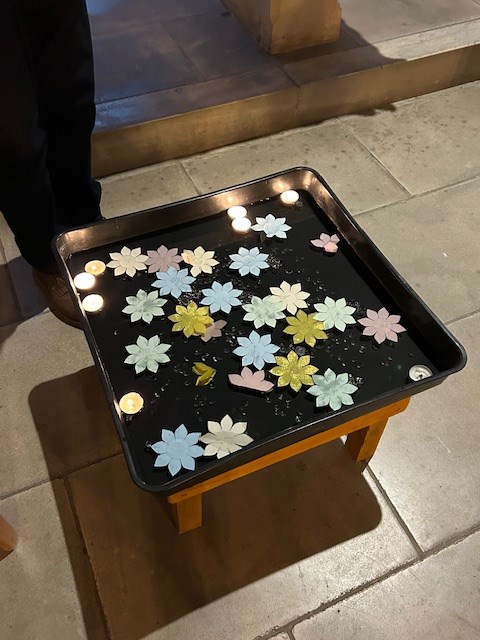 Prayers floating in water