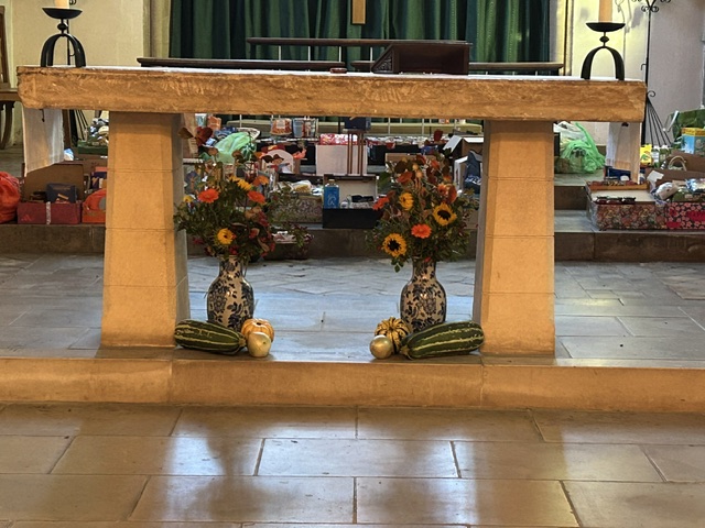 Harvest 2026 Under The Altar.
In the background can be seen some of the gifts brought in from the Junior School which will be sent to the Lincoln Food Larder